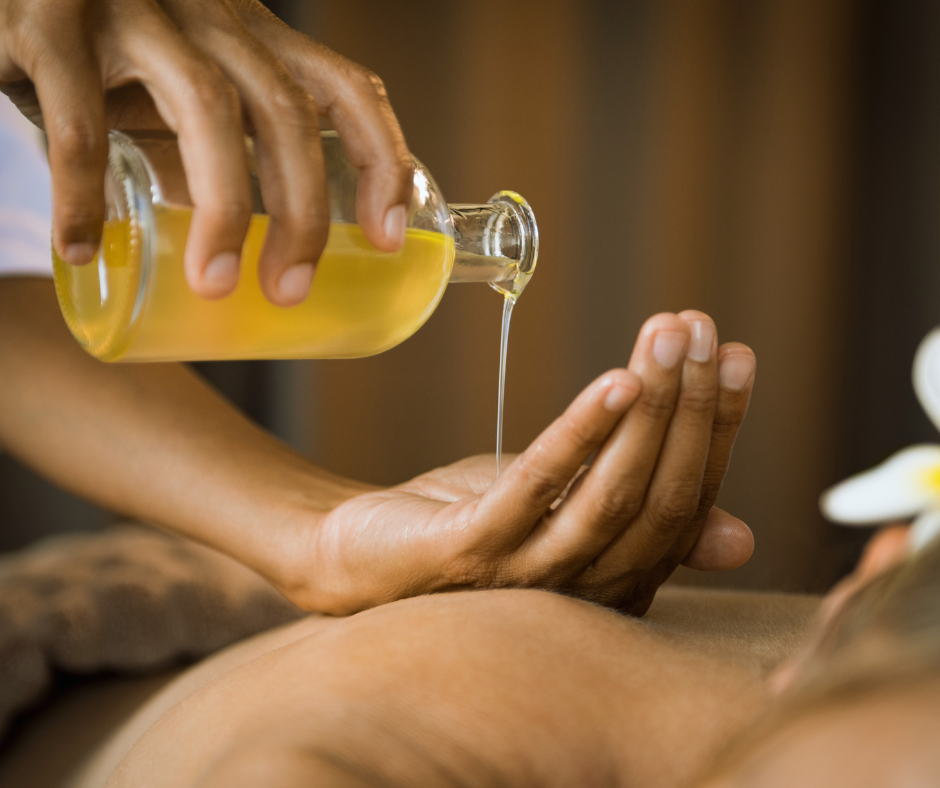 carrier oil for massage enhanced with essential oils