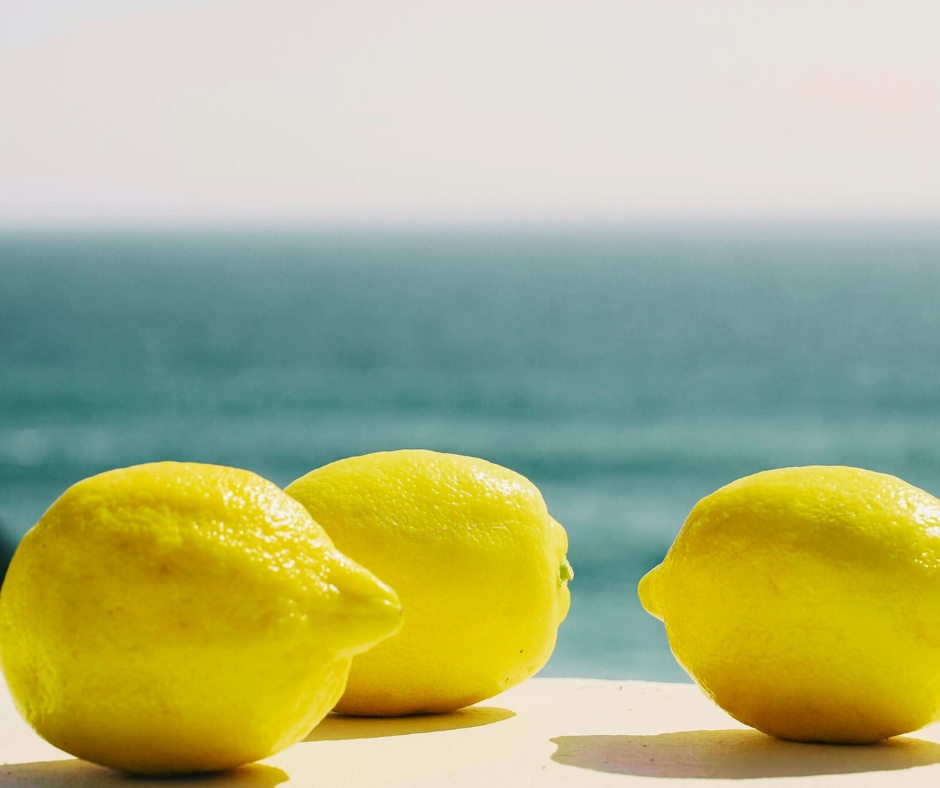 lemon fruit essential oil organic with sea background